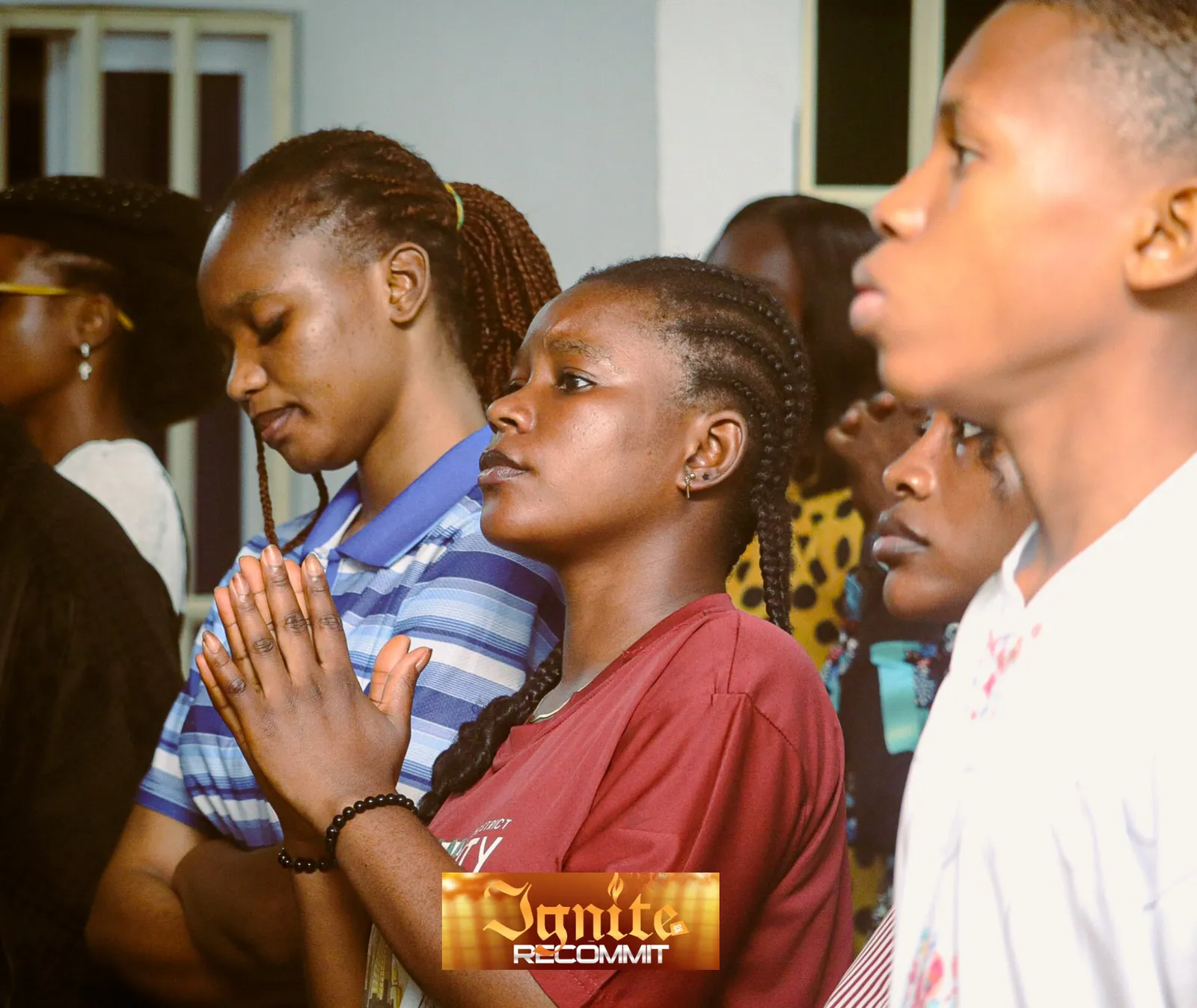 Young people in prayer at the Ignite 2026 gathering