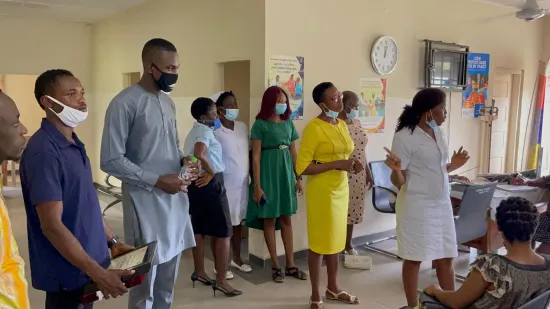 Outstanding nurse receiving an award, General Hospital Iquita, Oron, 2022