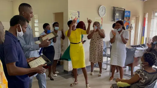 Outstanding nurse receiving an award, General Hospital Iquita, Oron, 2022
