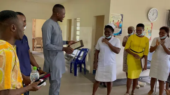 Outstanding nurse receiving an award, General Hospital Iquita, Oron, 2022