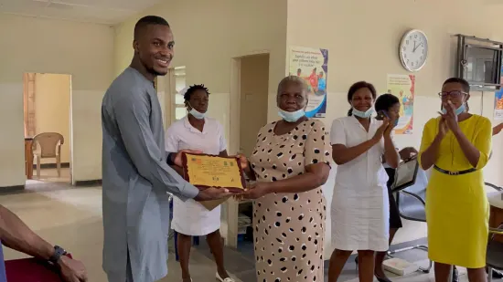 Outstanding nurse receiving an award, General Hospital Iquita, Oron, 2022