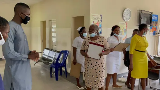 Outstanding nurse receiving an award, General Hospital Iquita, Oron, 2022