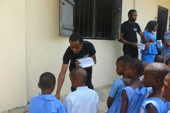 Handing out notebooks to pupils, One Child, One Pen, One Book 2023