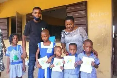 Pupils and their teacher with new notebooks, One Child, One Pen, One Book 2023