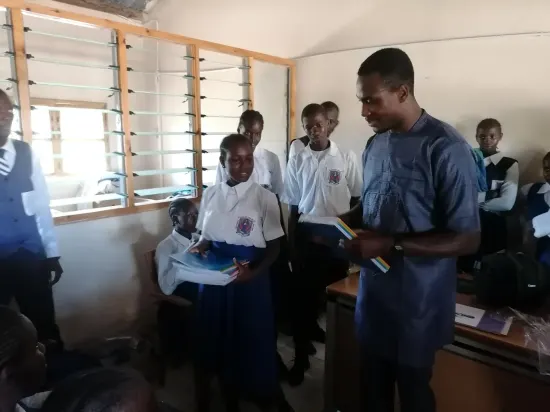 Classroom full of students during outreach, The Gambia 2024