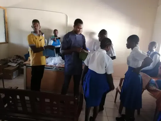 Speaker addressing students at a school outreach, The Gambia 2024