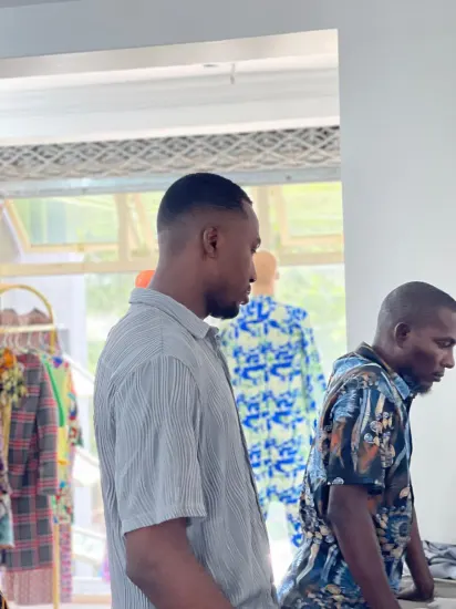 Visitors looking over the collection at the J&J Ante Fashion Center