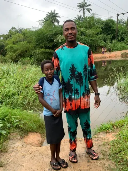 Baptism candidate going under the water, Nigeria 2023