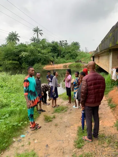 Ministry team and new believers gathered by the river, Nigeria 2023