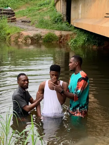 Ministry team and new believers gathered by the river, Nigeria 2023